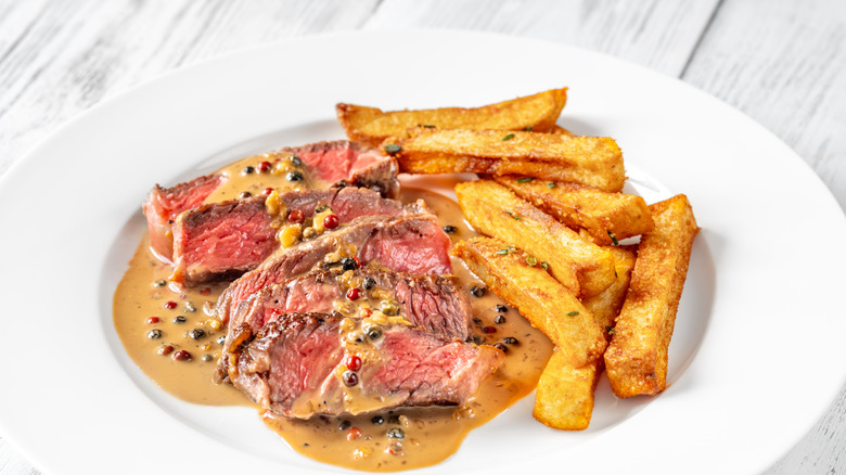 Plate of steak au poivre