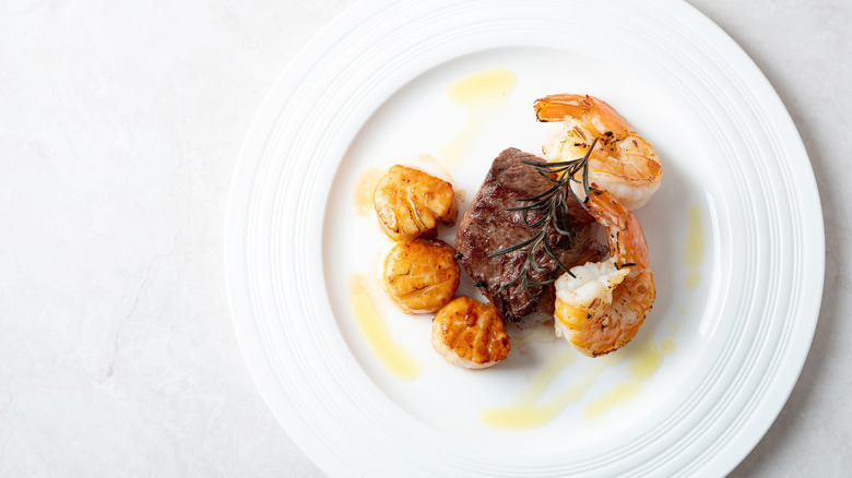 Steak with shrimp and scallops