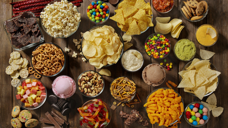 Overheat shot of multiple bowls of snacks