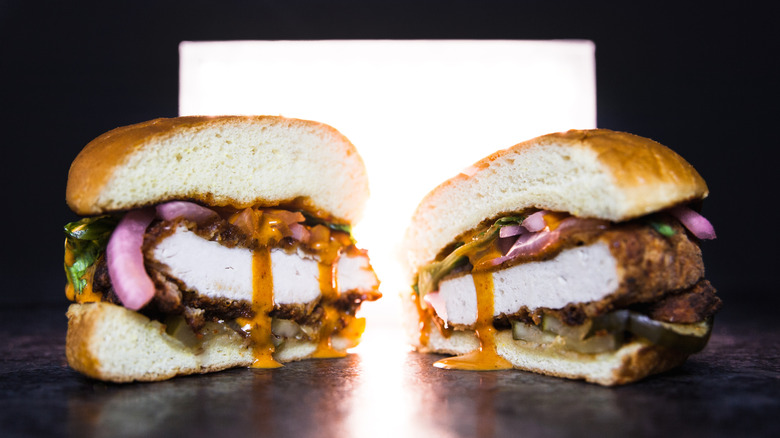 a cross section of a plant based chicken sandwich