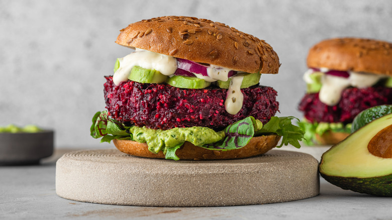 beet burger with avocado and sauce