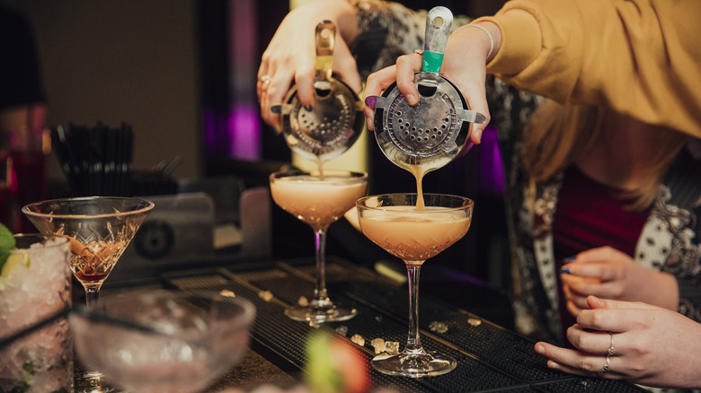 Pouring a cocktail