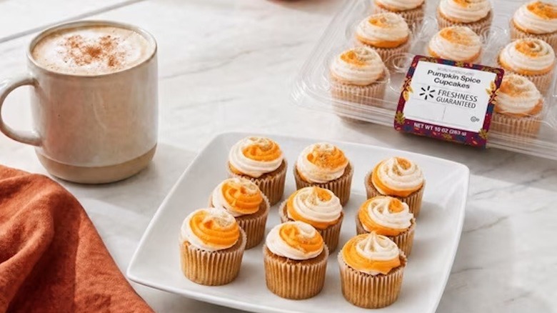 Nine Harvest Pumpkin Spice Mini Cupcakes sit atop a square white plate.