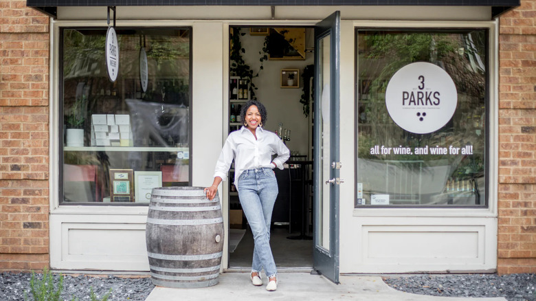 Sarah Pierre stands in front of 3 Parks