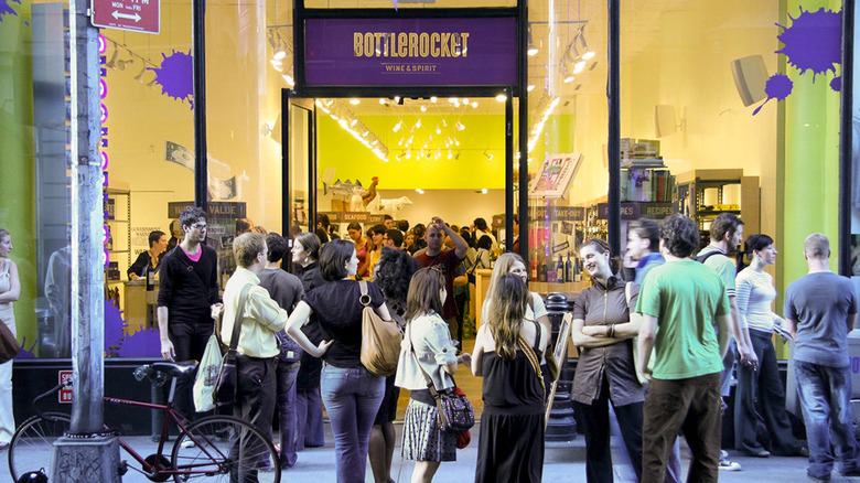 Customers gather outside bottlerocket store