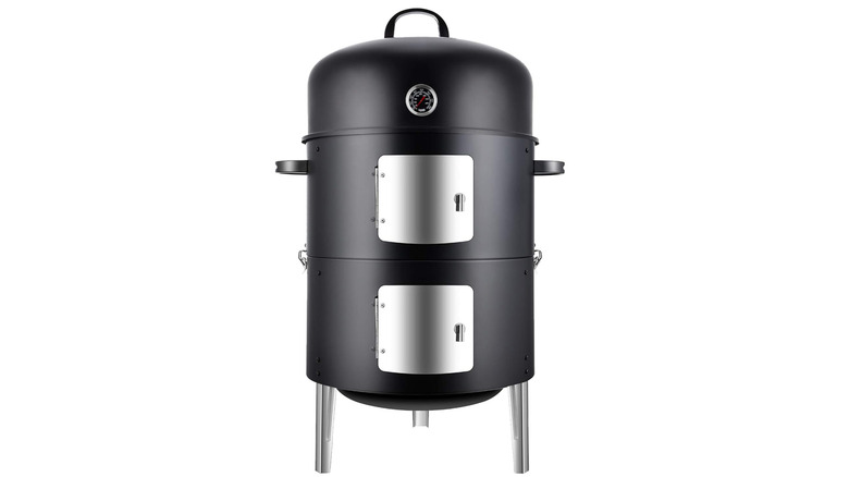 A black smoker with two silver doors