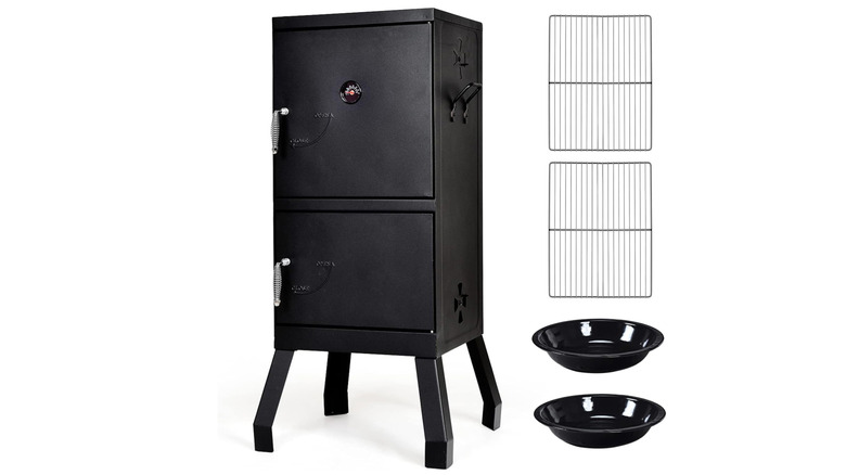 Black vertical smoker with racks and two black bowls