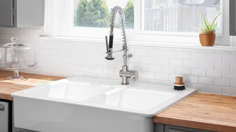 butcher block counters and a farmhouse sink