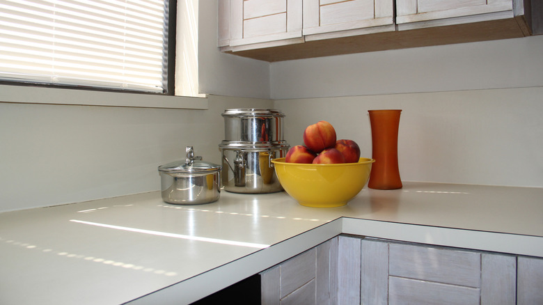 dated white laminate kitchen counter