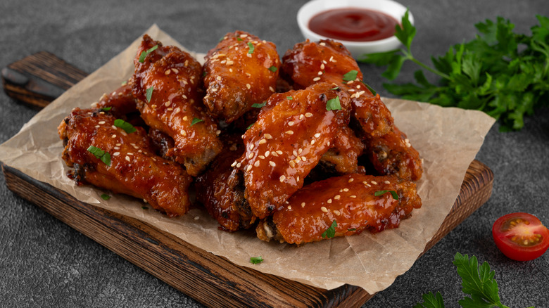 roasted barbecue chicken wings on parchment paper