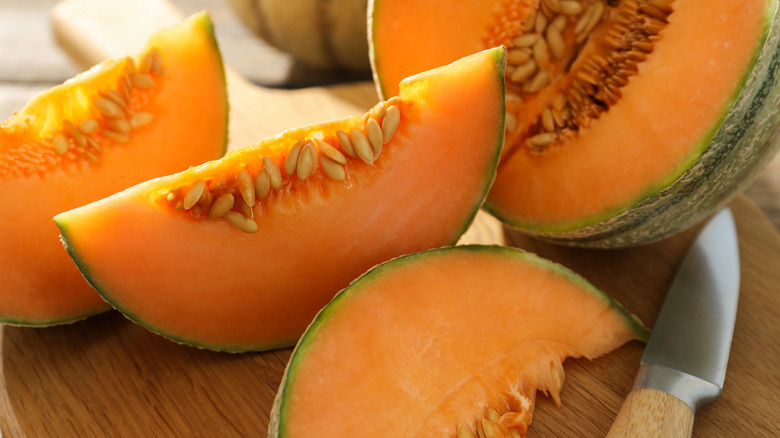 A photo of sliced cantaloupe.
