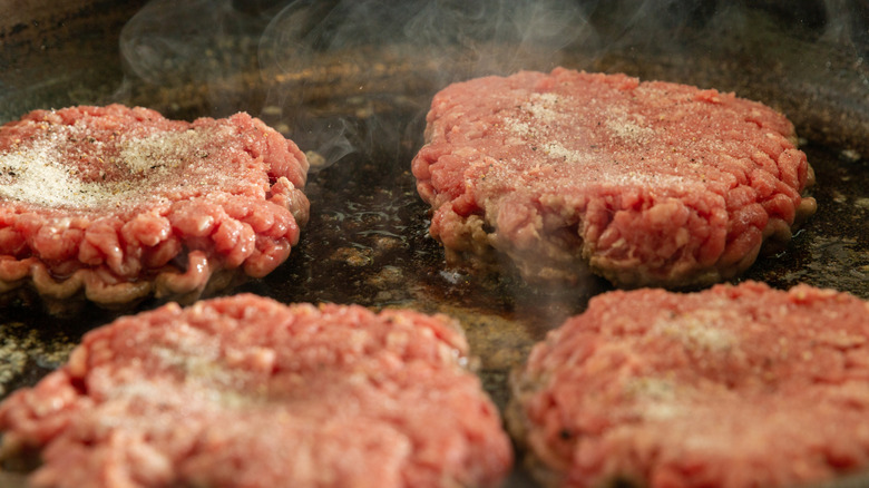 Dimpled raw burger patties
