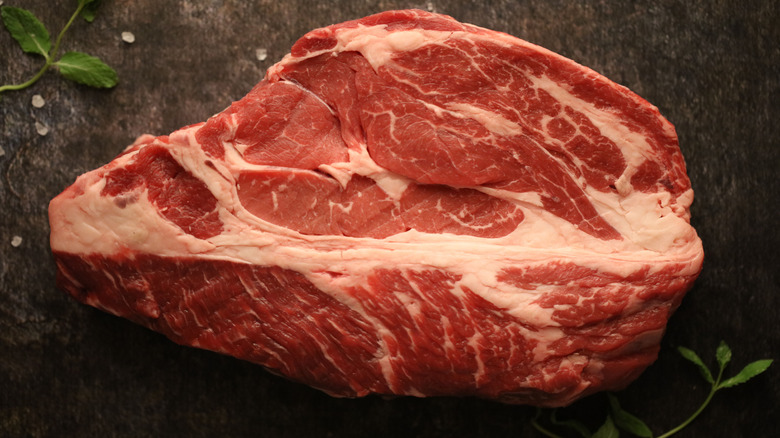 A piece of beef chuck on a counter