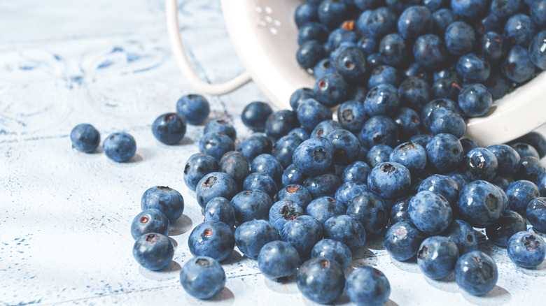 Blueberries poured onto a table