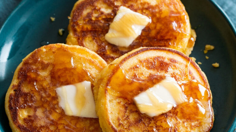 Johnny cakes with butter and syrup