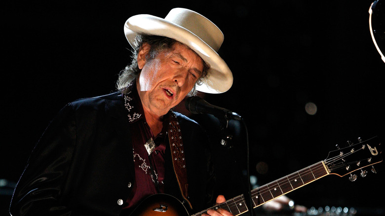 Bob Dylan playing electric guitar