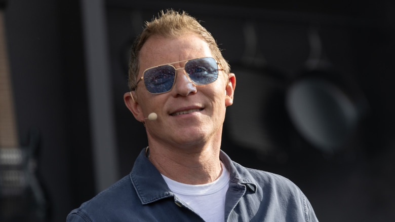 Bobby Flay smiling at an event