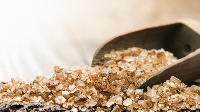A spoon full of flaky salt.