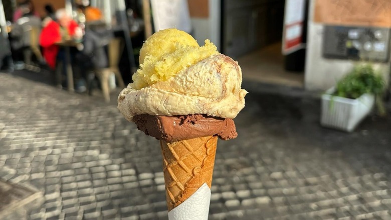 Three types of gelato on a cone from Otaleg Trastevere in Rome