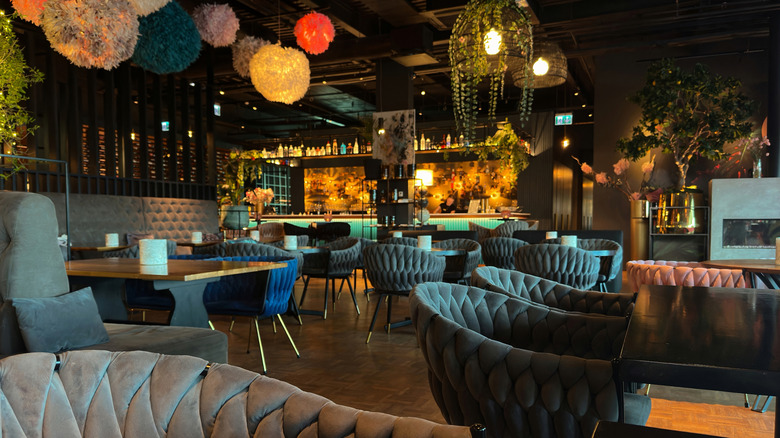 Moody, dark restaurant with low lighting
