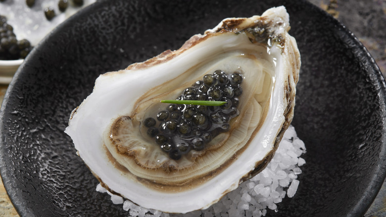 oyster garnished with caviar