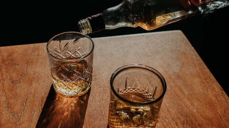 Pouring a glass of bourbon