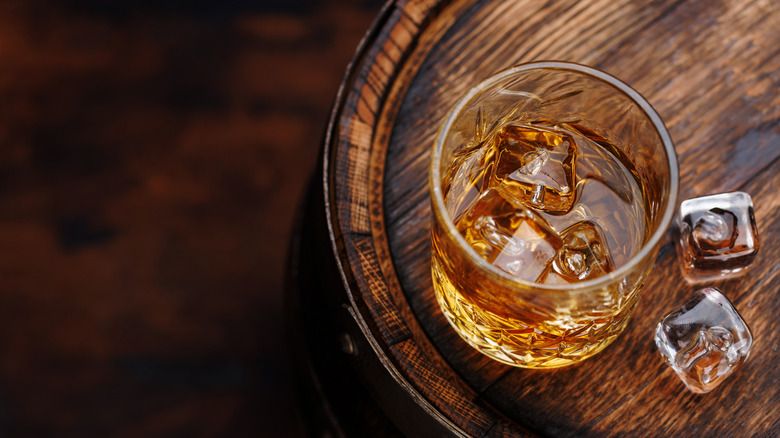 Glass of bourbon with clear ice inside