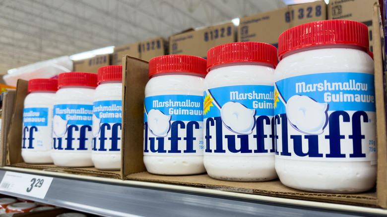 Jars of Marshmallow Fluff line a store shelf