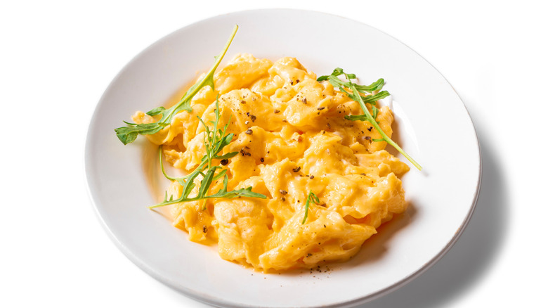 Classic egg-based breakfast scramble in a dish