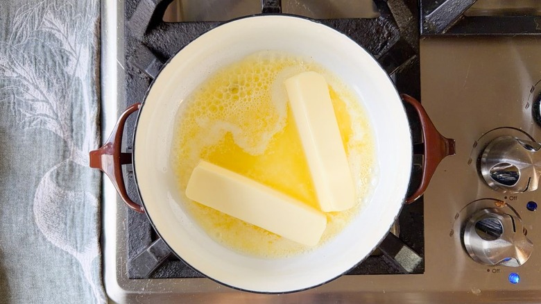Butter heating in saucepan on stovetop