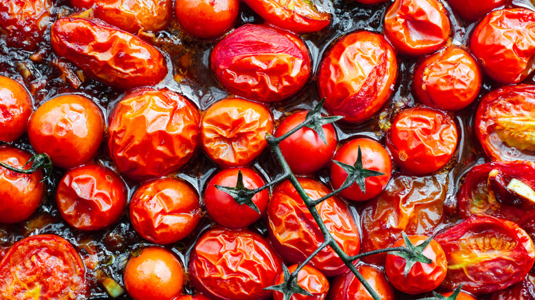 roasted tomatoes on a sheet pan