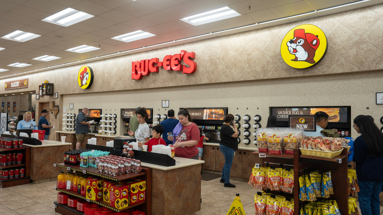 Interior of Buc-ee's with several shoppers looking around.