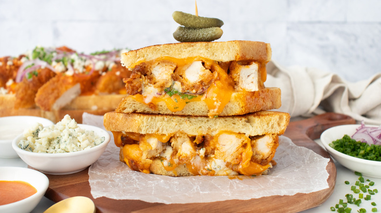 Side shot of a buffalo chicken grilled cheese sandwich