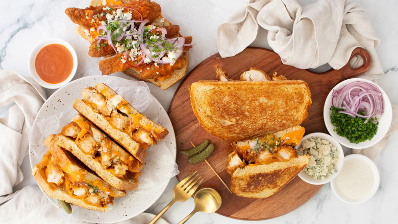 Overhead shot of several buffalo chicken grilled cheese sandwiches