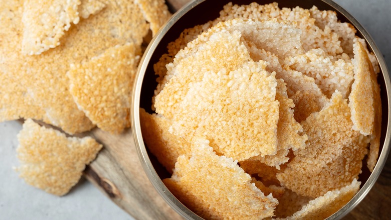 A bowl full of nurungji, a Korean crispy rice snack