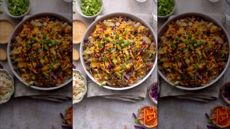 Egg roll in a bowl next to garnish