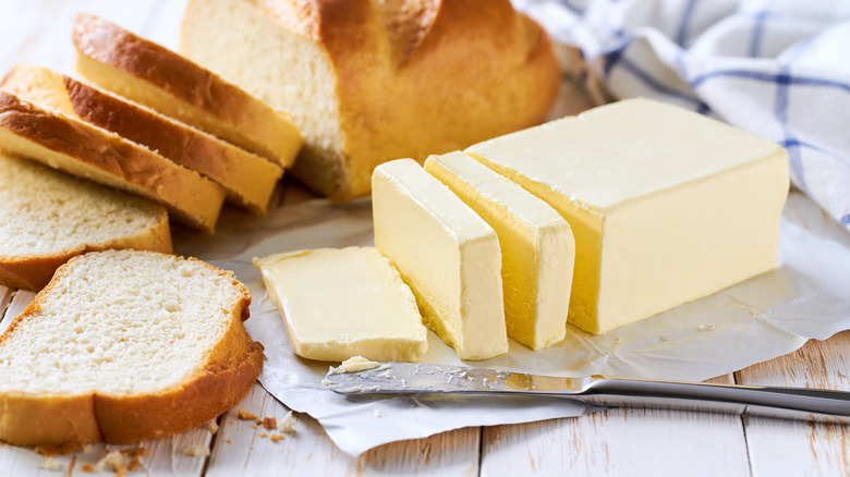 Stick of butter and bread