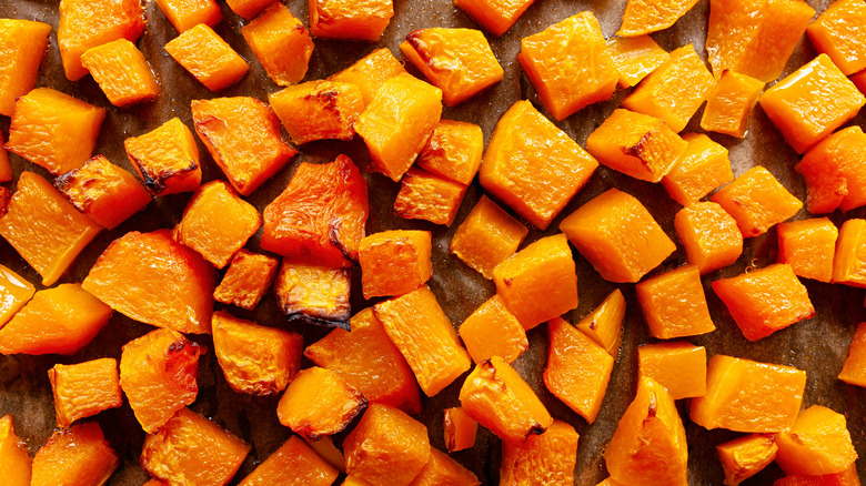 Top view of roasted butternut squash cut in small pieces