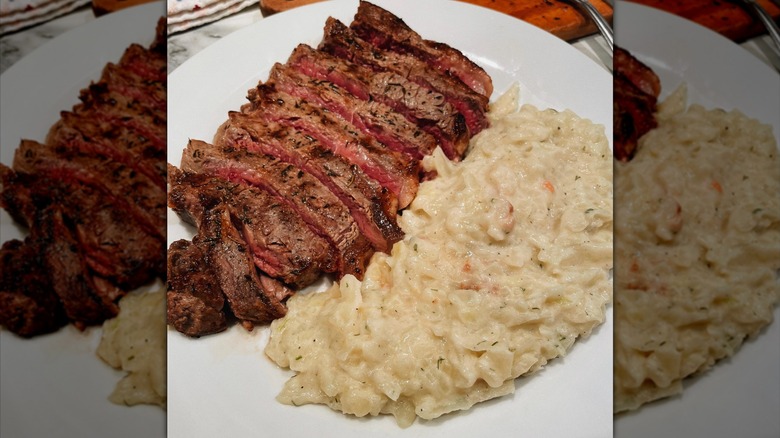Steak and creamed cabbage on a plate
