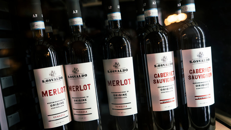 Bottles of Merlot and Cabernet Sauvignon.