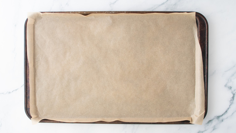 A large baking sheet lined with parchment paper