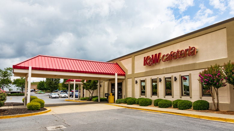 One of a southern chain of cafeteria-style restaurants. Exterior and parking lot.