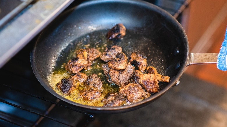 Cajun alligator bites in a pan