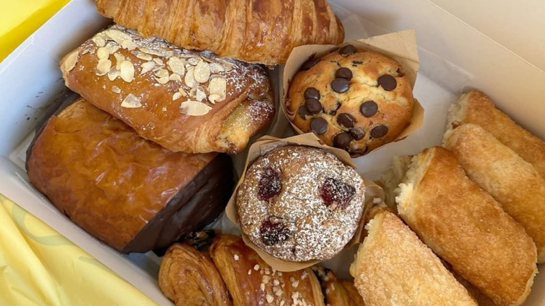 Baked goods from Porto's Bakery neatly stacked on top of each other