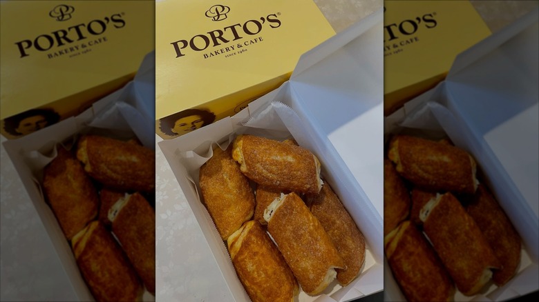 Six cheese rolls from Porto's Bakery placed inside a box