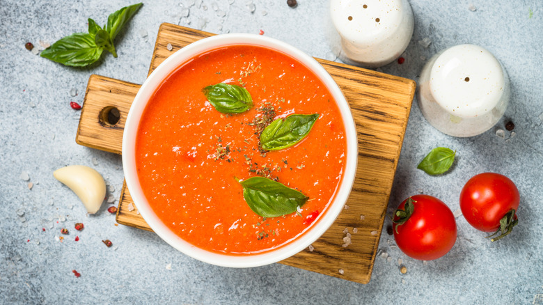Tomato soup and cutting board