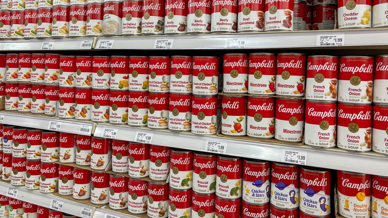 Assorted Campbell's soups on shelves