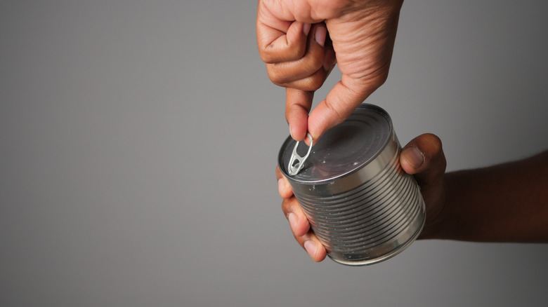 Opening pull tab can