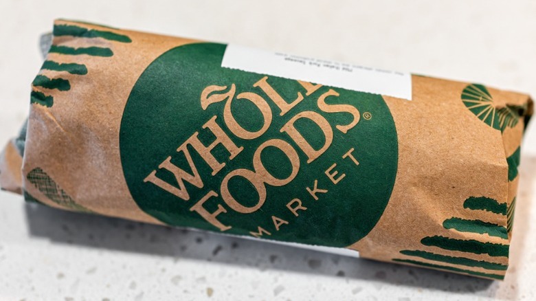 A paper-wrapped package of meat from Whole Foods' butcher