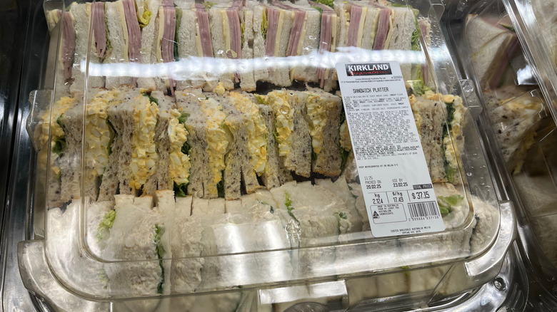 A large tray of assorted Costco sandwiches.